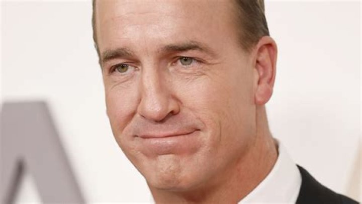 The Piece Of Advice Peyton Manning Gave Travis Kelce Before Hosting SNL |